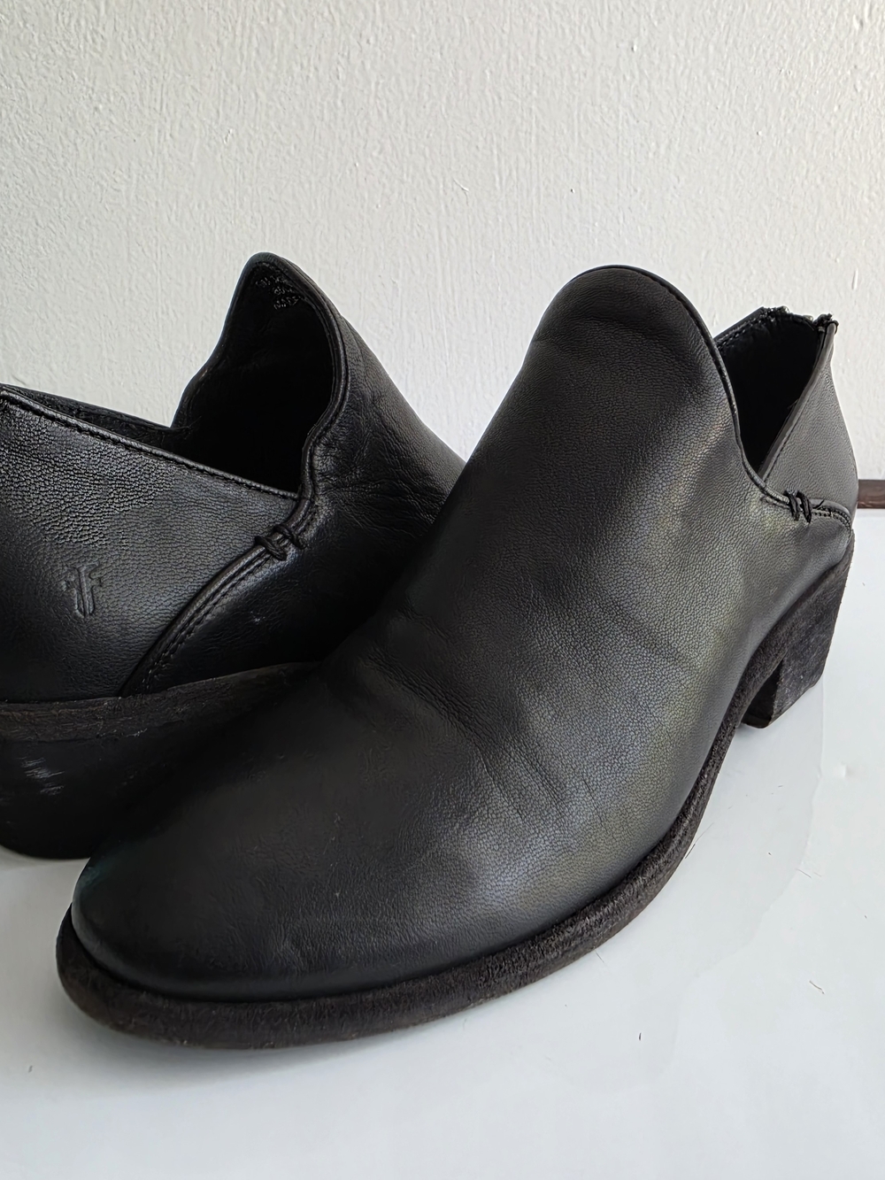 Frye Black Leather Slip-On Ankle Booties